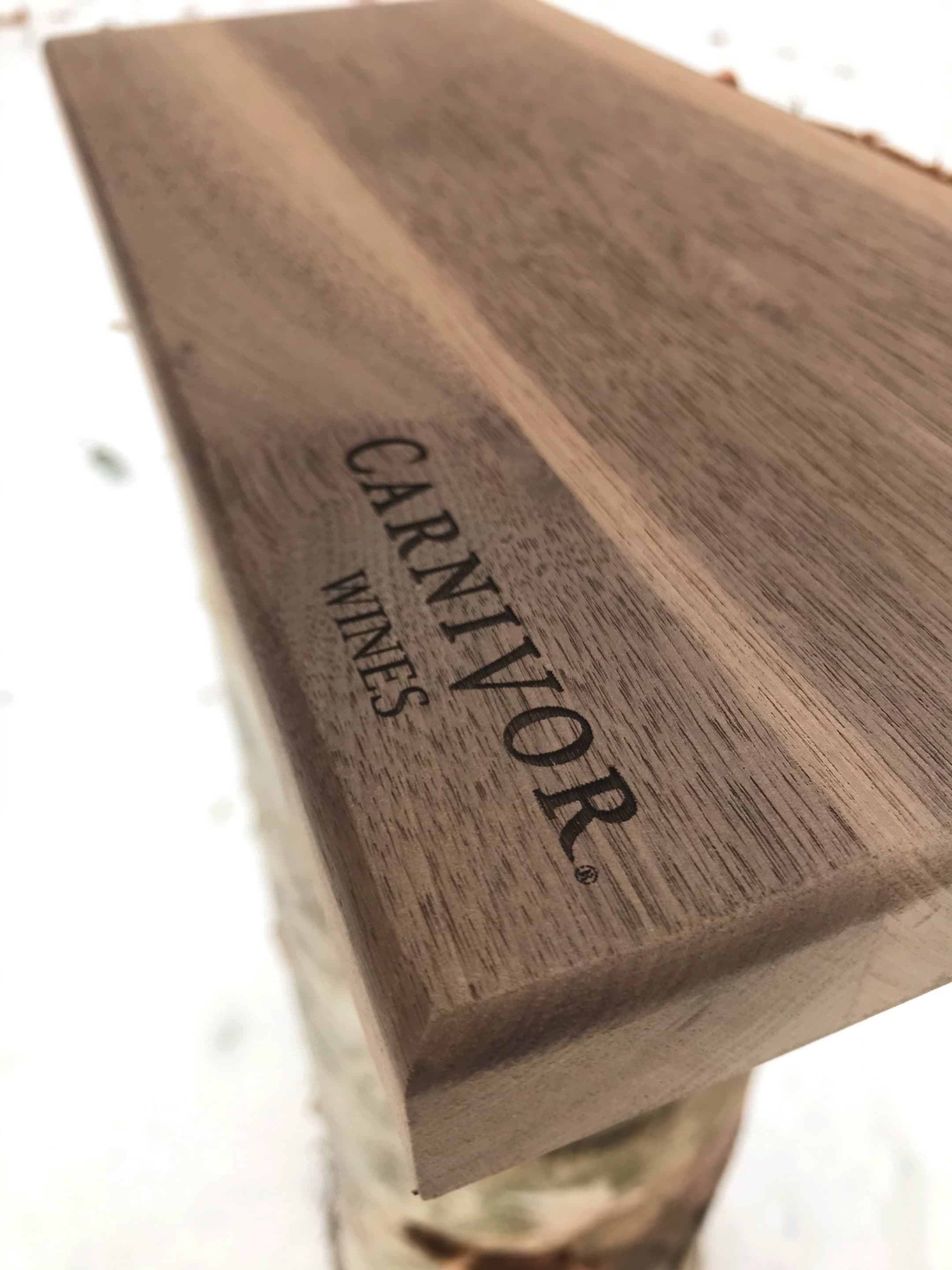 Single walnut steak board with Carnivor Wines logo engraved on the end
