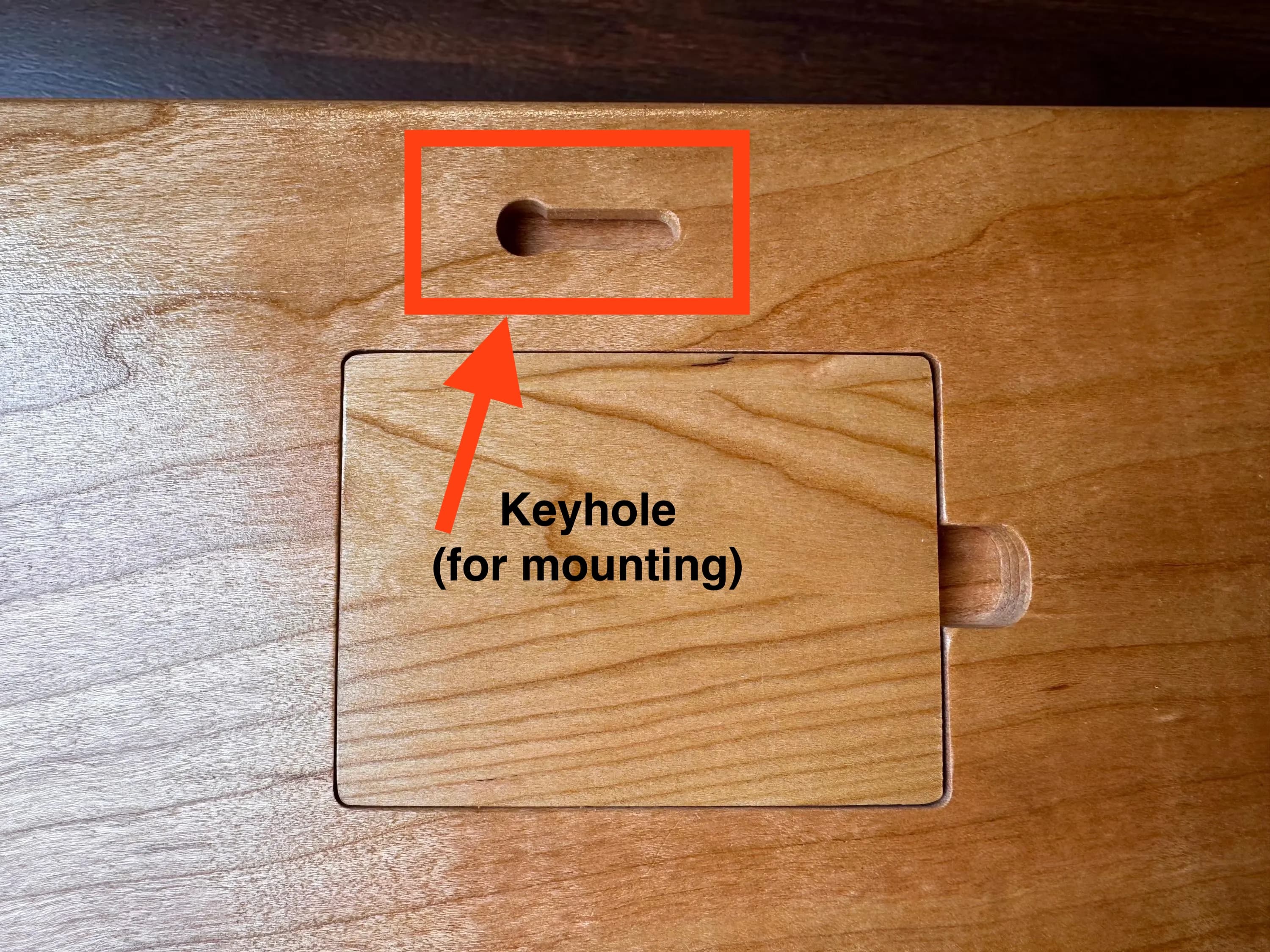 Keyhole slot built into the back of the cribbage board for wall mounting