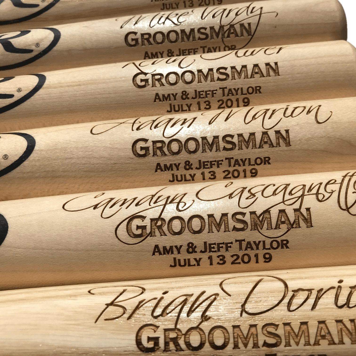 Full lineup of engraved groomsmen mini baseball bats showing all names and roles