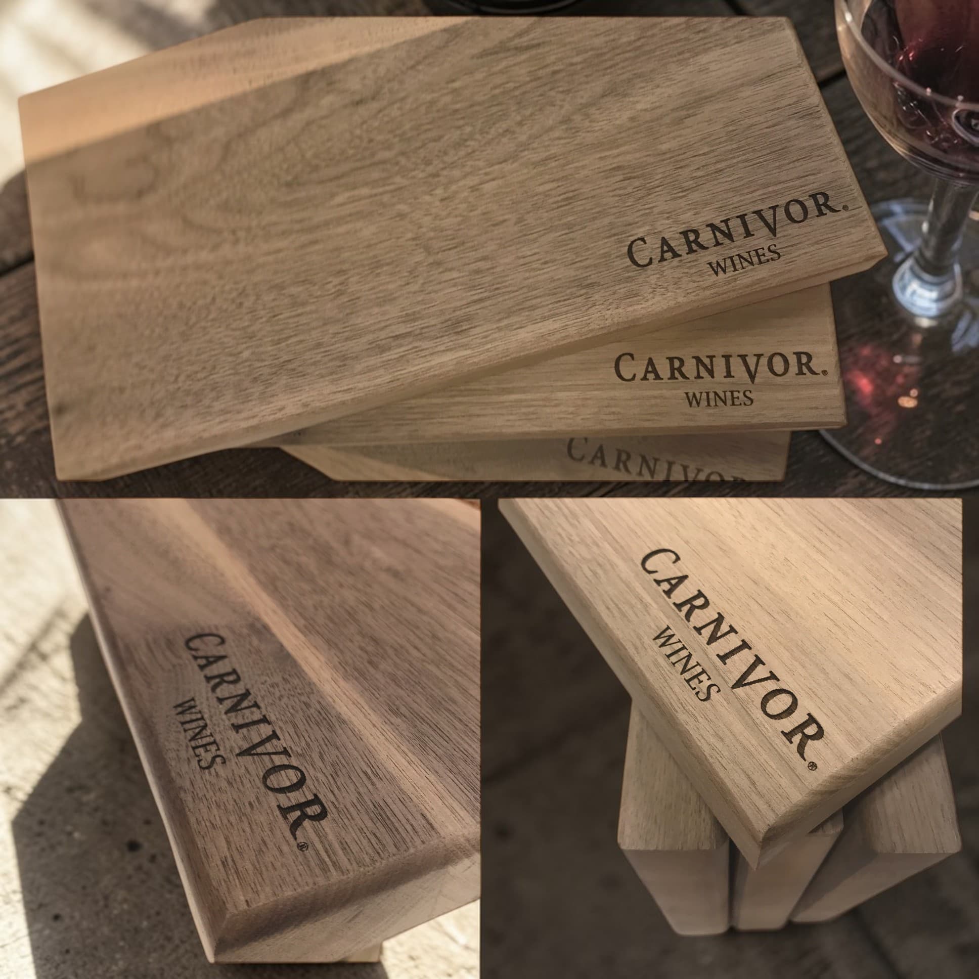 Walnut steak boards engraved with the Carnivor Wines logo, shown from multiple angles with a glass of red wine